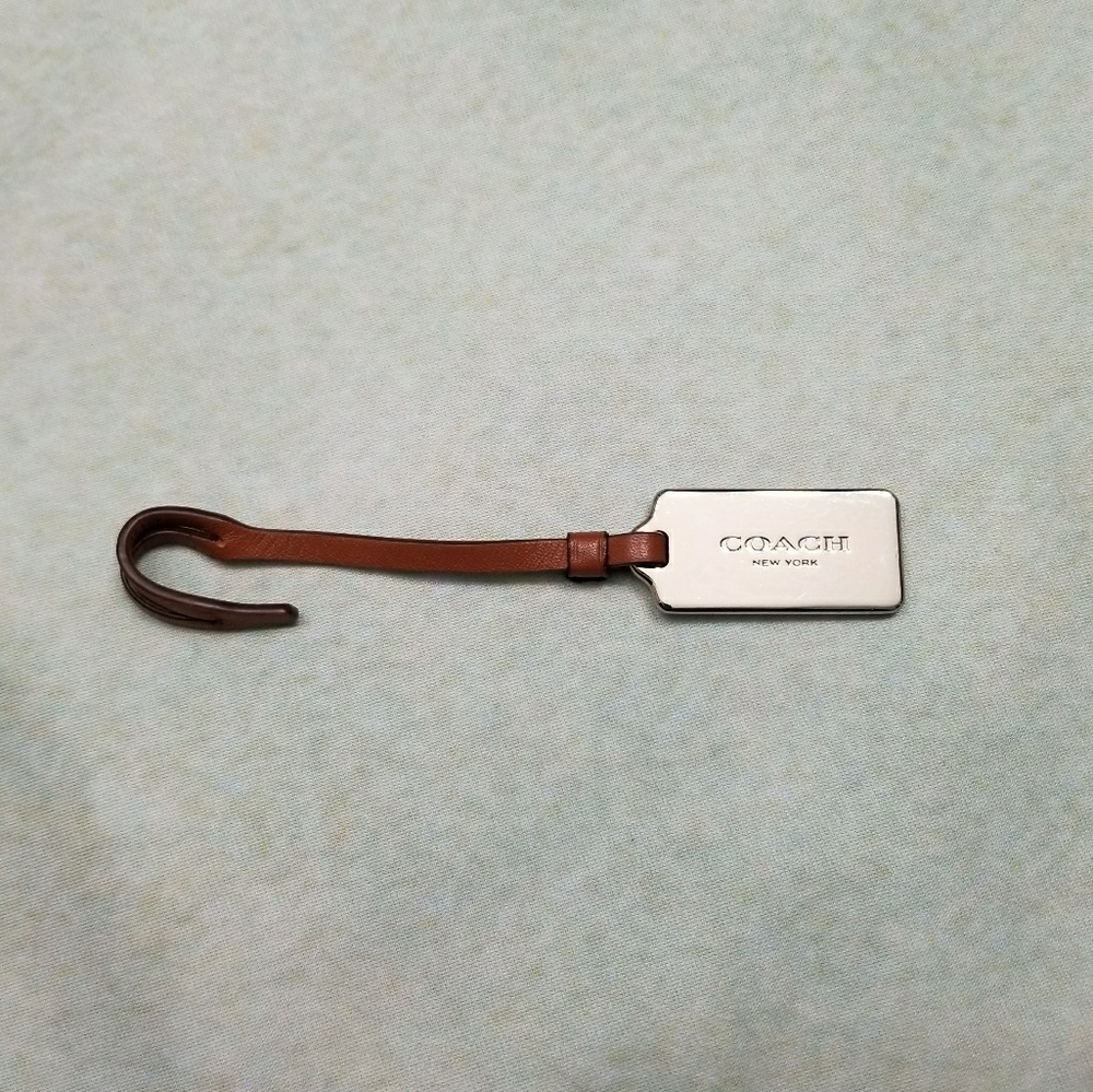 Coach Silver Hang Tag With Brown Leather Strap